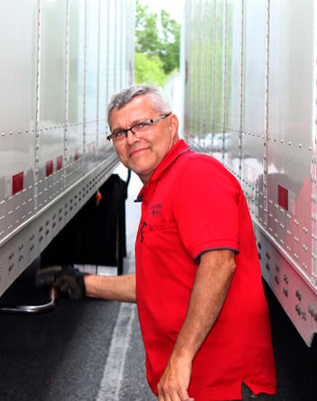 SunBelt employee working on a truck